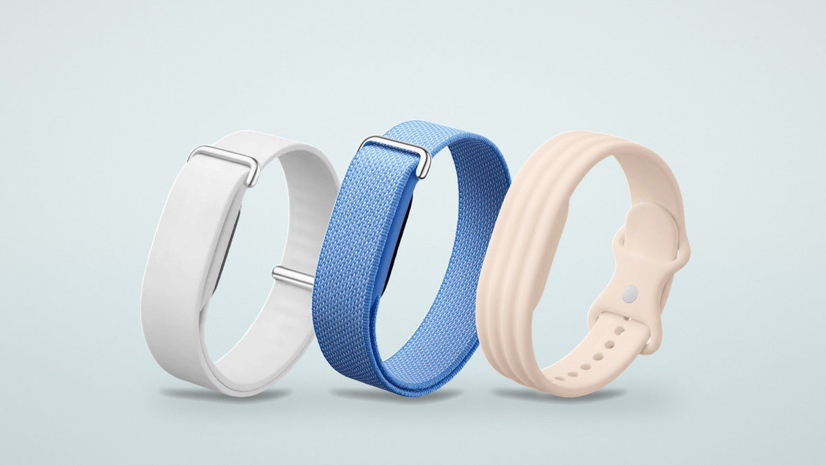 Clean Fitbit Air straps: white silicone loop, blue nylon loop and pink ribbed silicone band